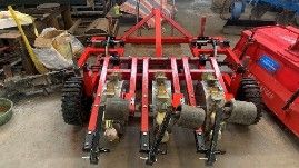 氣吸輔助機械式谷子精量排種器